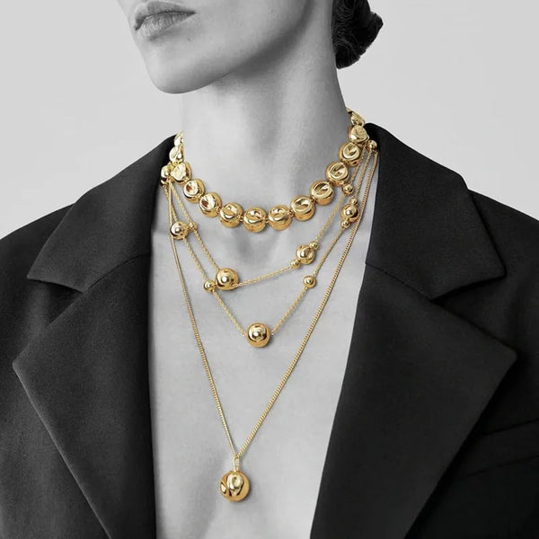 Niche design irregular concave golden ball long necklace light luxury high-end layered sweater chain women's fashion accessory