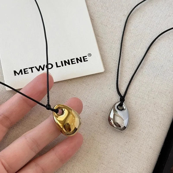 Minimalist Black Leather Rope Necklace Women's Autumn and Winter Simple Fashion Irregular Metal Pendant Long Sweater Chain